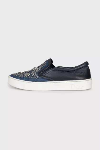 Textile slip-ons decorated with sequins