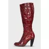 Red leather boots with embossing