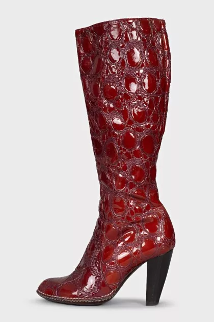 Red leather boots with embossing
