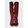 Red leather boots with embossing