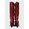 Red leather boots with embossing