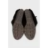 Suede ankle boots decorated with fur