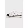 White textile sneakers with a contrasting toe