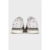 White textile sneakers with a contrasting toe