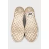 White textile sneakers with a contrasting toe