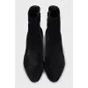 Black suede ankle boots with a stacked heel