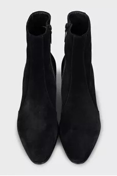 Black suede ankle boots with a stacked heel