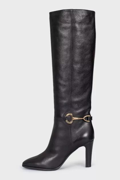 Black leather boots with gold trim