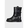 Black leather boots with silver trim