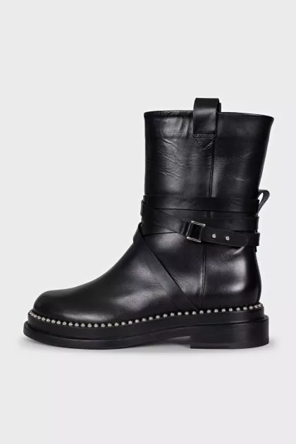 Black leather boots with silver trim