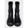Black leather boots with silver trim
