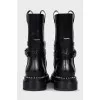 Black leather boots with silver trim