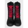 Lace-up boots made of leather and textile