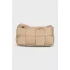 A textile bag with a signature weave