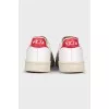 White leather sneakers with contrasting heels