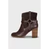 Brown ankle boots with gold hardware