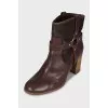 Brown ankle boots with gold hardware