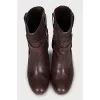 Brown ankle boots with gold hardware