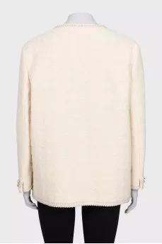 Beige jacket with accent buttons
