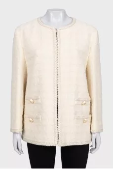 Beige jacket with accent buttons