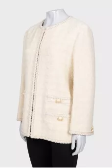 Beige jacket with accent buttons