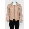 Jacket with a zip with a figured neck