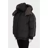 Reversible down jacket with signature print