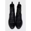 Textured leather boots with elastic bands