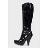 Patent leather boots with a figured heel