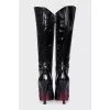 Patent leather boots with a figured heel