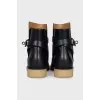 Leather boots with silver buckle