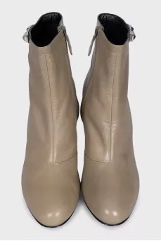 Beige ankle boots with a zipper