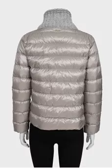 Straight jacket with knitted elements