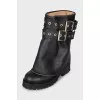 Leather boots with a patch