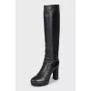 Insulated black leather boots