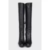 Insulated black leather boots