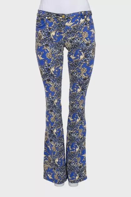 Blue flared jeans with a print