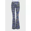Blue flared jeans with a print