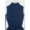 Fitted dress with a full skirt and belt
