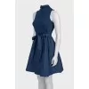 Fitted dress with a full skirt and belt