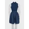 Fitted dress with a full skirt and belt