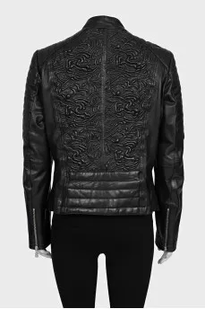 Leather jacket with a relief pattern on the back