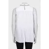 Blouse with pleats decorated with crystals