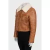 Short sheepskin coat with buttons