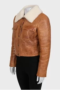 Укорочена дублянка на кнопках