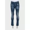 Men's slim fit jeans with a ripped effect and print