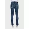 Men's slim fit jeans with a ripped effect and print