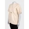 Beige T-shirt with gold decor