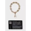 Gold bracelet with pendant