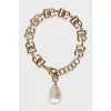 Gold bracelet with pendant